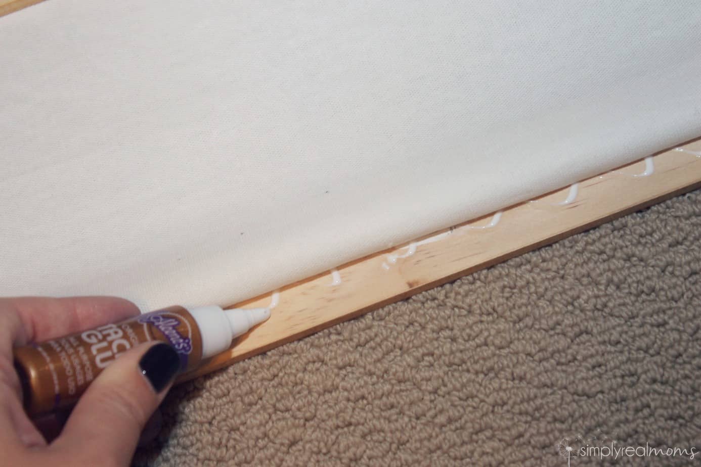 Applying tapestry to frame
