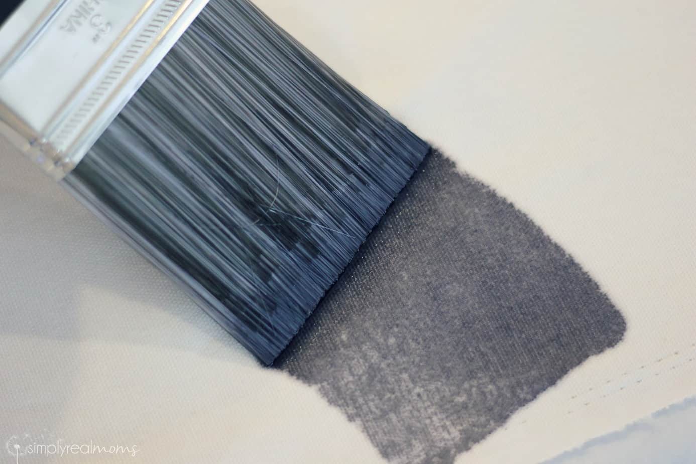 Brush dye onto canvas