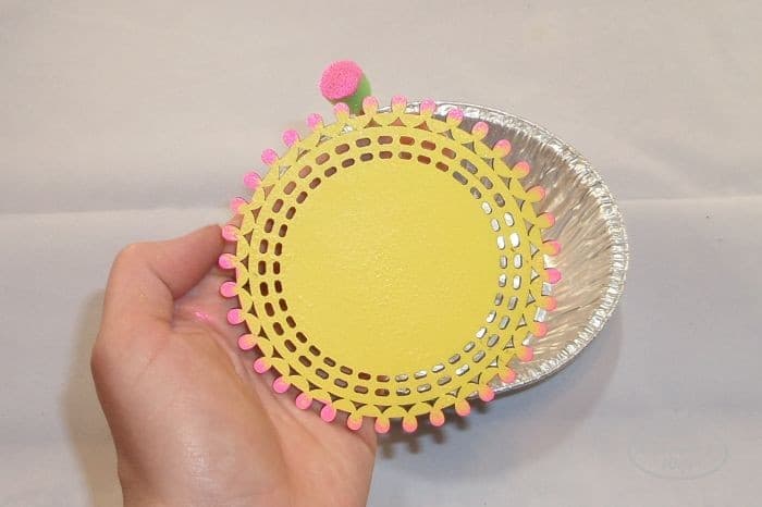 Sponge the tips on the design pink
