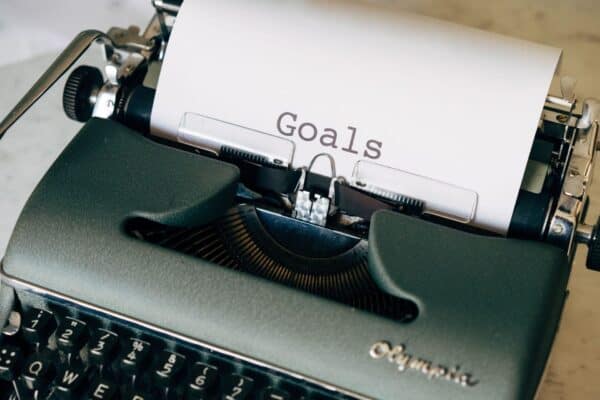 typewriter writing the word goals