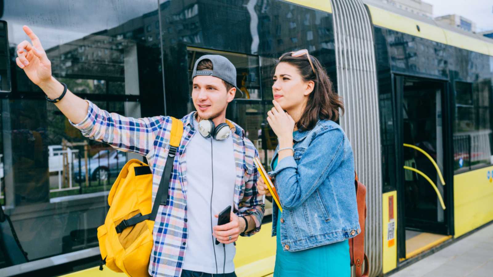 Man showing way to traveler
