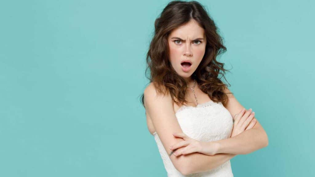 Woman angry folding hands