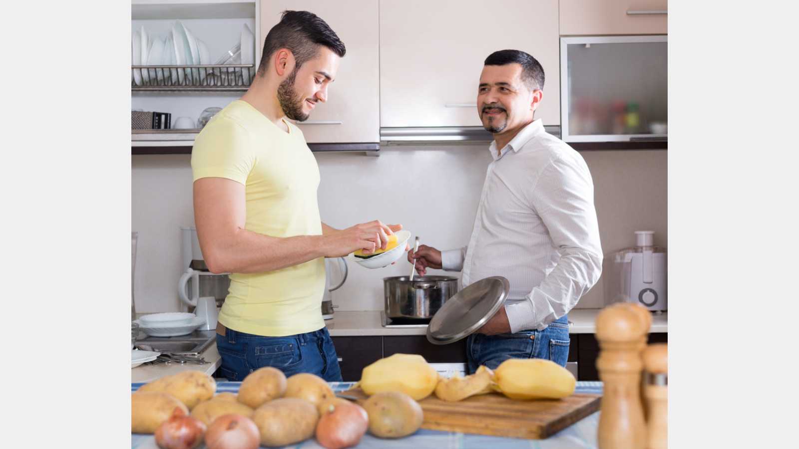 Two friends cooking