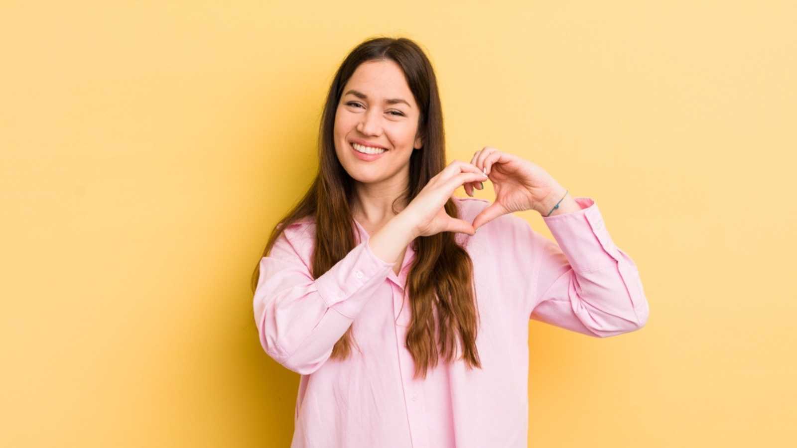 woman smiling and feeling happy