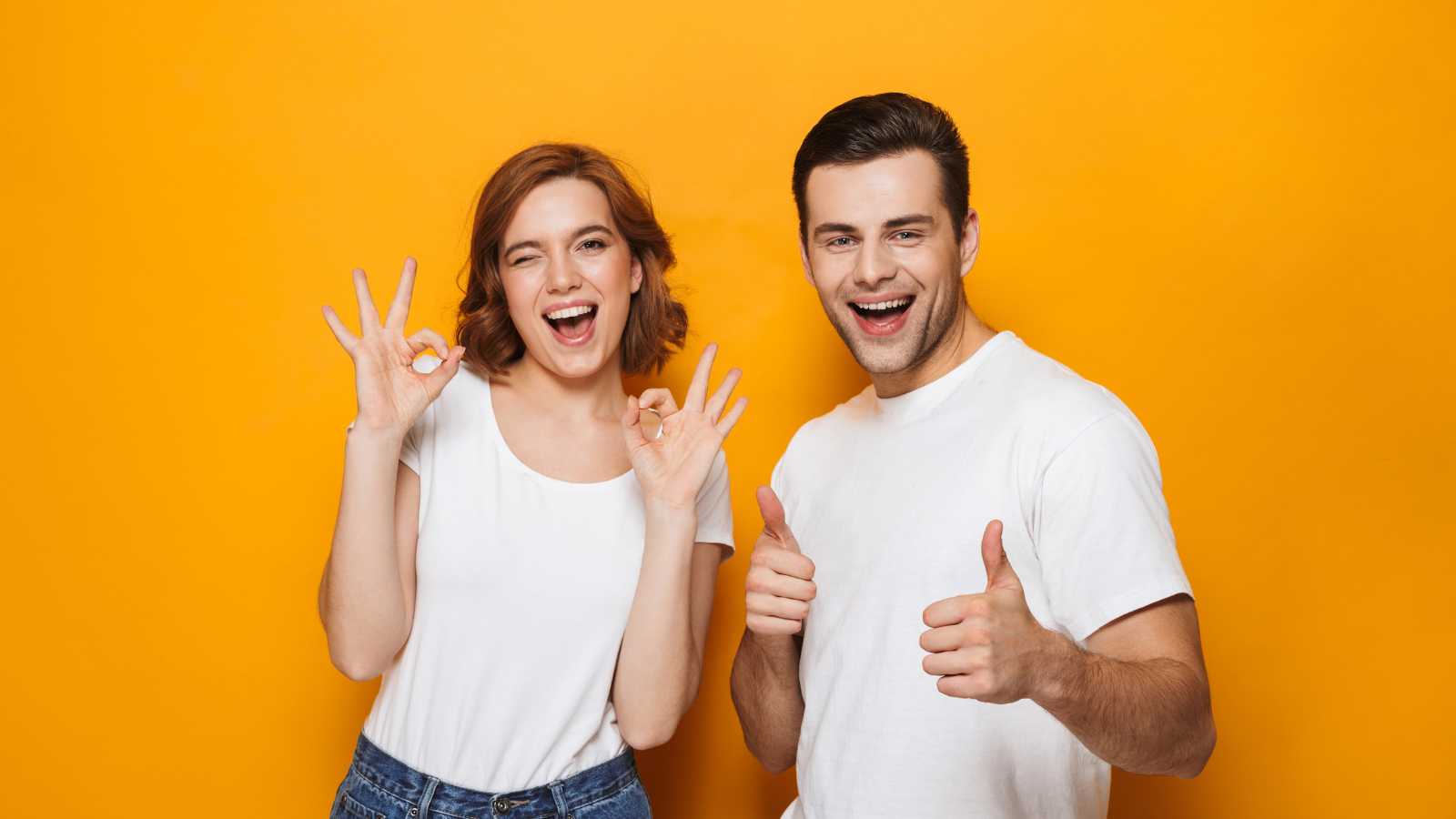 Couples showing thumbs up