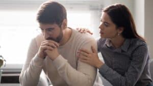Unhappy man with wife
