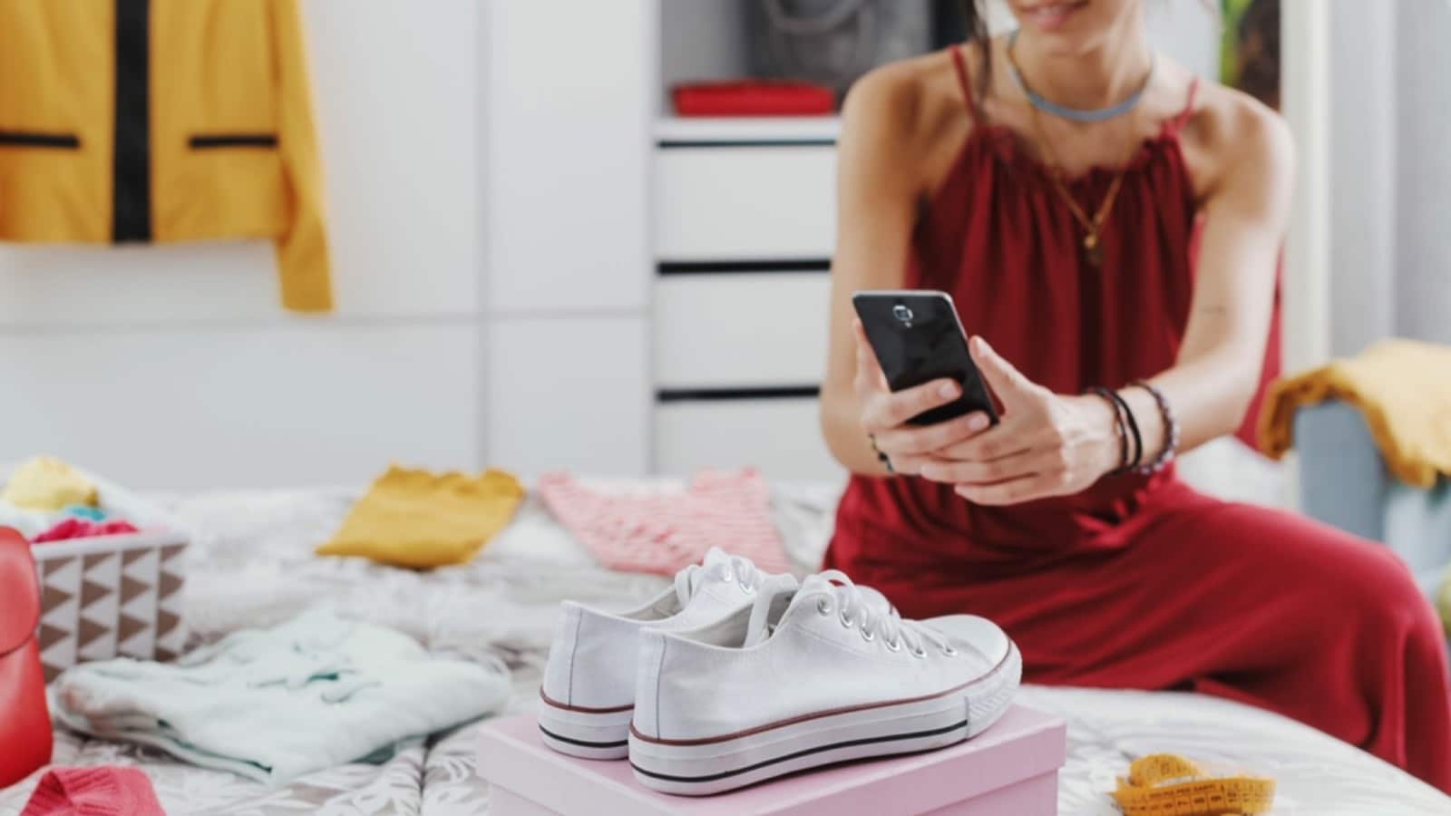 Woman taking photo of shoes