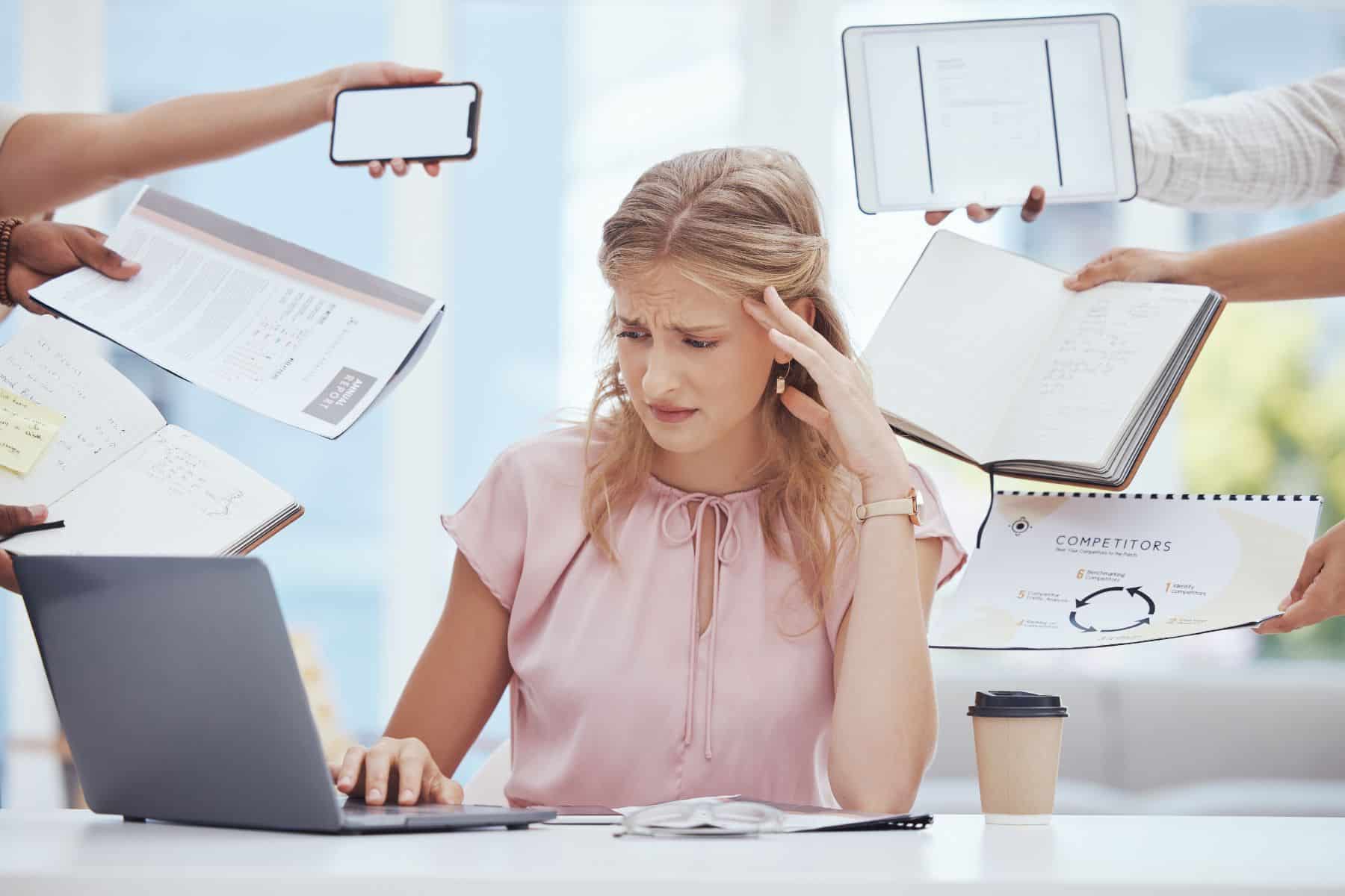 Businesswoman stress, anxiety and burnout in busy office of poor time management, tax audit and company crisis.